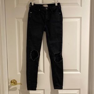 Free People women’s low waisted distressed jeans size 24